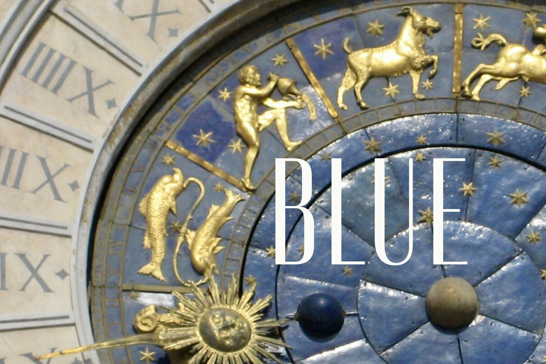 Photo of a detail of the famous clock on St Marco Square in Venice with golden zodiac symbols on blue enamel backing and the word BLUE overlayed